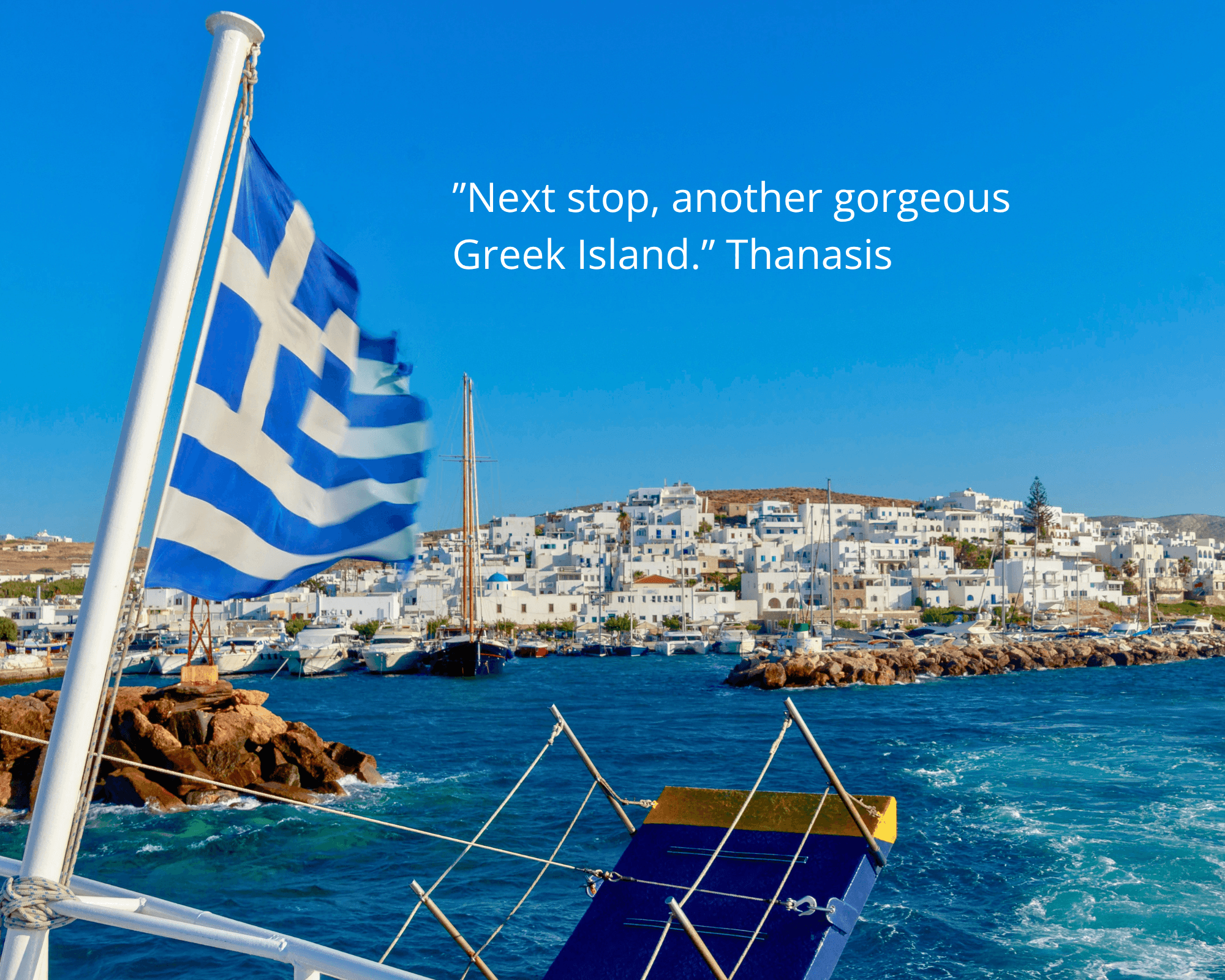 The view from a ferry deck arriving into a Cycladic port, Greek flag flying - Monobrow Ferries